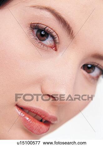 Stock Photo - Lipstick, Human Lips, White Background, Looking At Camera, Pampering. Fotosearch