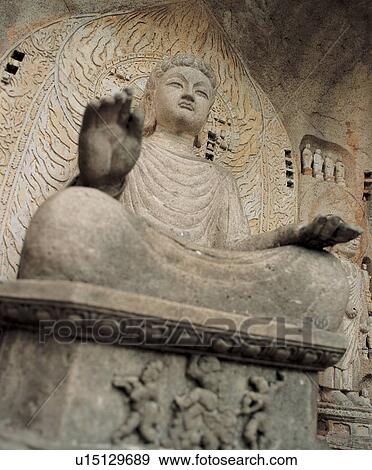 Stock Photo - lord buddha, historic, sitting, history, religion, monument. Fotosearch
