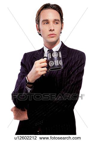 business executive, well-dressed, standing, business, professional, coffee mug View Large Photo Image Stock Image - business executive, well-dressed, standing, business, professional, coffee mug. Fotosearch