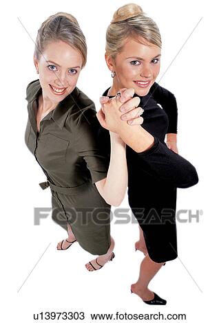 business executives, business women, human cut outs, business executive, holding hands, back to back View Large Photo Image Stock Image - business executives, business women, human cut outs, business executive, holding hands, back to back. Fotosearch