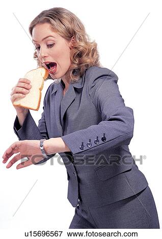 business, human cut outs, holding, looking down, hurry, young adult View Large Photo Image Stock Photo - business, human cut outs, holding, looking down, hurry, young adult. Fotosearch