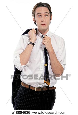 Stock Photograph - button down shirt, standing, half length, man only, young adult. Fotosearch