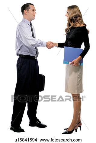 Picture - human cut outs, business executives, white background, well-dressed. Fotosearch