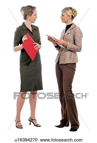 Stock Image - human cut outs, business executives, white background, well-dressed. Fotosearch