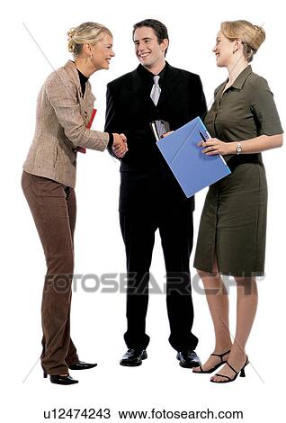 meeting, discussion, smiling, lifestyle, looking at each other, business, shaking hands View Large Photo Image Stock Image - meeting, discussion, smiling, lifestyle, looking at each other, business, shaking hands. Fotosearch