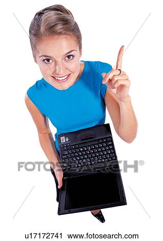 pointing finger, one person, toothy smile, hand in air, laptop View Large Photo Image Stock Image - pointing finger, one person, toothy smile, hand in air, laptop. Fotosearch
