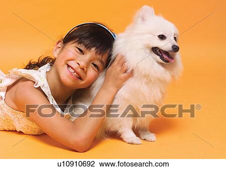 Stock Image - canine, close-up, cheerful, care, affectionate. Fotosearch