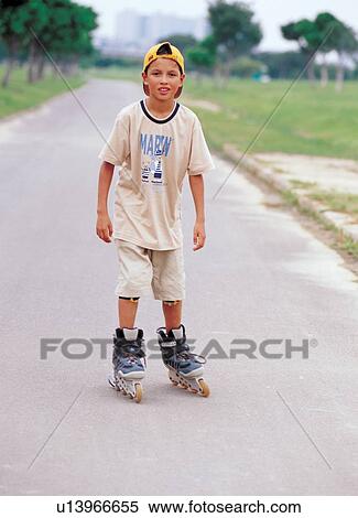 Stock Photography - action, boy only, boy, 6-7 years. Fotosearch