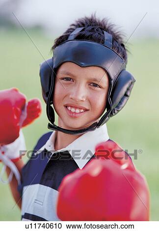 aggression, boy, boxing helmet, 6-7 years View Large Photo Image Stock Image - aggression, boy, boxing helmet, 6-7 years. Fotosearch