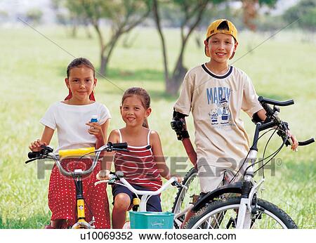 Stock Image - bicycle, boys, blurred, 6-7 years. Fotosearch