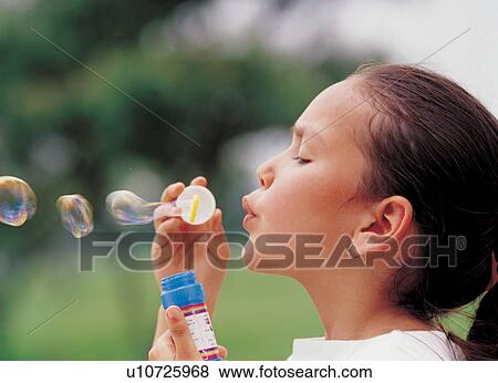blowing, blurry, blur, 6-7 years View Large Photo Image Stock Photo - blowing, blurry, blur, 6-7 years. Fotosearch