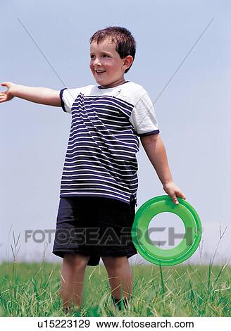 Stock Photo - boy, cheerful, 6-7 years. Fotosearch