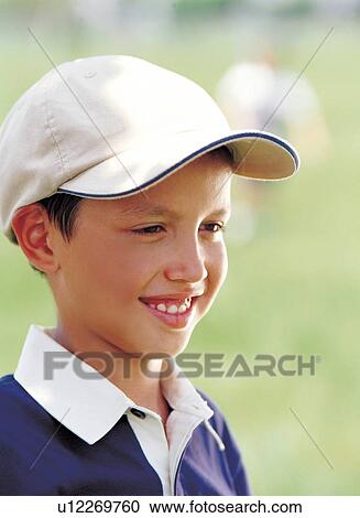 Stock Image - casual, toothy smile, youth, boy, outdoor, lifestyle. Fotosearch