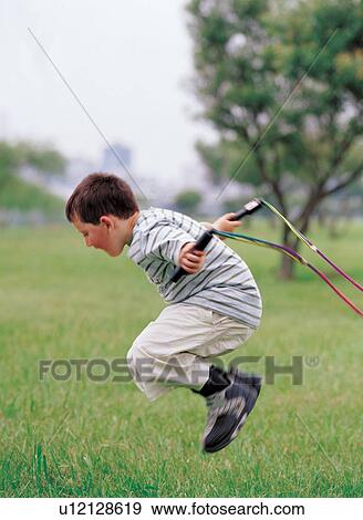 cheerful, lifestyle, green, day, playing, happiness, child View Large Photo Image Stock Photo - cheerful, lifestyle, green, day, playing, happiness, child. Fotosearch