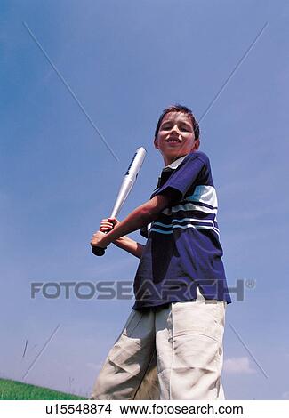 emotion, playful, toothy smile, sports equipment, baseball bat View Large Photo Image Picture - emotion, playful, toothy smile, sports equipment, baseball bat. Fotosearch