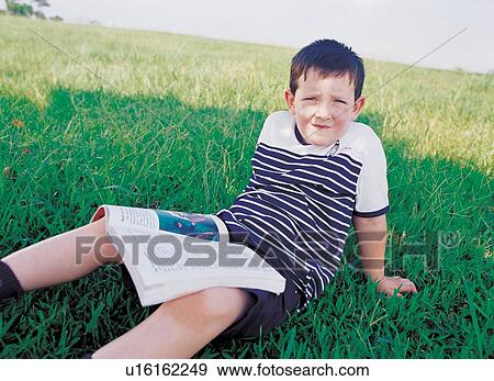 happiness, close-up, outdoor, grass, leisure, quarter length, sitting View Large Photo Image Stock Photo - happiness, close-up, outdoor, grass, leisure, quarter length, sitting. Fotosearch