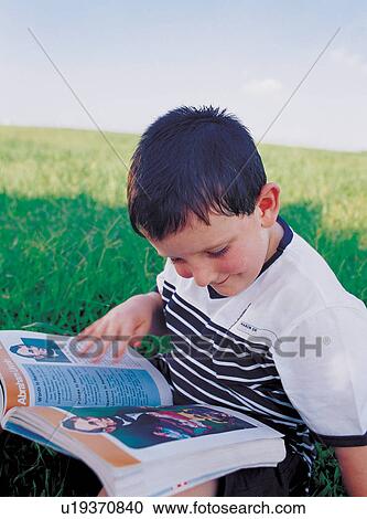 Stock Image - happy, expression, culture, squinting, youth, close-up, boy. Fotosearch