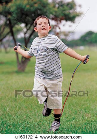 lifestyle, emotion, playing, sticking out tongue, expression, individual, child View Large Photo Image Picture - lifestyle, emotion, playing, sticking out tongue, expression, individual, child. Fotosearch
