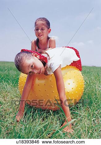 Stock Photograph - waist up, culture, outdoor, kid, happy. Fotosearch