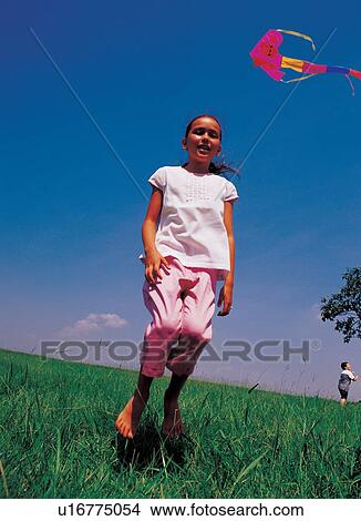 Picture - youth, outdoor, happiness, day, 6-7 years. Fotosearch