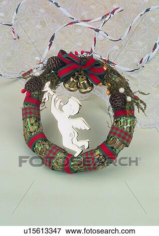 Stock Photo - , bell, holiday, Christmasm angel, decoration, ribbon. Fotosearch