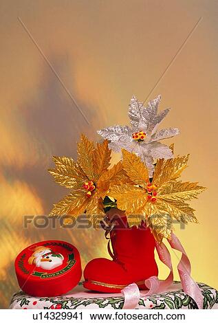 Stock Image - , decoration, holiday, Christmas, poinsettia, gold. Fotosearch