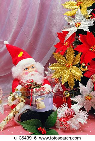 , decoration, santa claus, christmas tree, poinsettia, holiday View Large Photo Image Stock Photograph - , decoration, santa claus, christmas tree, poinsettia, holiday. Fotosearch