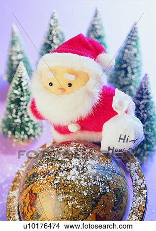 Picture - , tree, Christmas, tree, santa claus, hat. Fotosearch