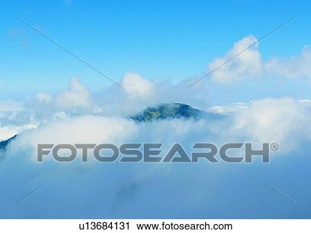 cloud, peak, light, sky, daytime, mountain View Large Photo Image Stock Image - cloud, peak, light, sky, daytime, mountain. Fotosearch