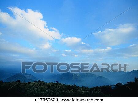 Stock Photo - daytime, cloud, sky, scenery, mountain, light. Fotosearch