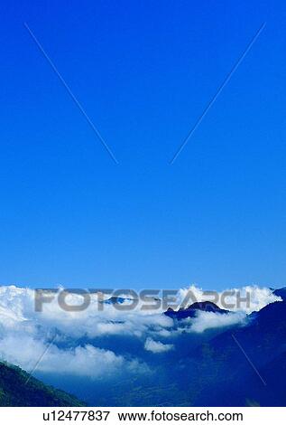 mountain, cloud, light, daytime, peak, scenery View Large Photo Image Stock Photo - mountain, cloud, light, daytime, peak, scenery. Fotosearch