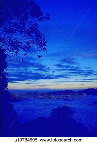Stock Photography - sky, scenery, mountain, light, cloud, tree. Fotosearch
