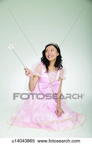 Stock Photography - Angel, Black Hair, Asian Ethnicity, Artificial Wing, 18-19 Years. Fotosearch