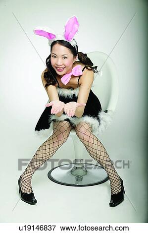 Asian Ethnicity, Chair, Bow, Black Hair, 18-19 Years View Large Photo Image Stock Photo - Asian Ethnicity, Chair, Bow, Black Hair, 18-19 Years. Fotosearch