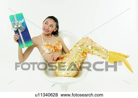 Asian Ethnicity, Cheerful, Chair, Black Hair, 18-19 Years View Large Photo Image Stock Photo - Asian Ethnicity, Cheerful, Chair, Black Hair, 18-19 Years. Fotosearch