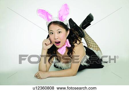 Stock Photo - Asian Ethnicity, Close-Up, Bow, Black Hair, 18-19 Years. Fotosearch