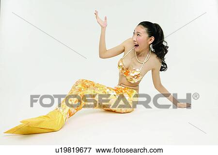 Stock Photo - Asian Ethnicity, Costume, Cheerful, Black Hair, 18-19 Years. Fotosearch