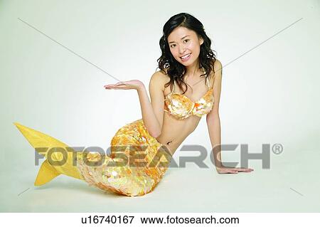 Black Hair, Costume, Creative People, Hand Sign, Leaning, Asian Ethnicity View Large Photo Image Stock Photo - Black Hair, Costume, Creative People, Hand Sign, Leaning, Asian Ethnicity. Fotosearch