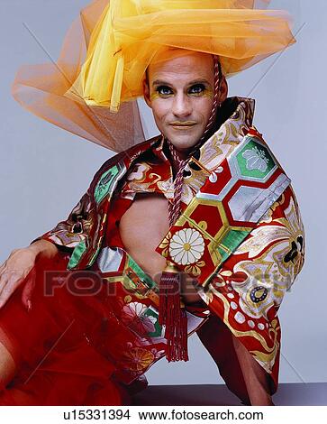 Close-Up, Costume, Colored Background, Asian Ethnicity View Large Photo Image Picture - Close-Up, Costume, Colored Background, Asian Ethnicity. Fotosearch