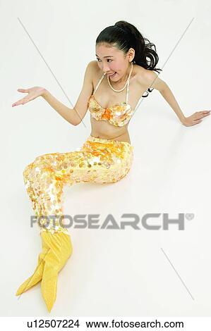 Costume, Smiling, 18-19 Years, Hand Sign, Wrapped View Large Photo Image Picture - Costume, Smiling, 18-19 Years, Hand Sign, Wrapped. Fotosearch