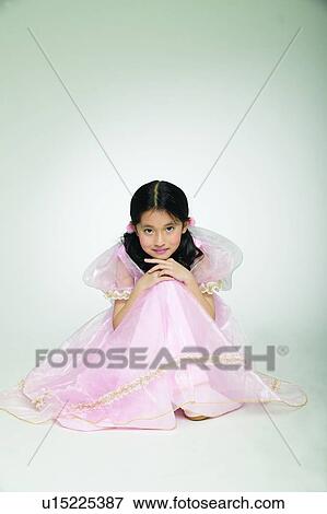 Stock Photo - Creative, One Child Only, Spirituality, Hand On Chin. Fotosearch