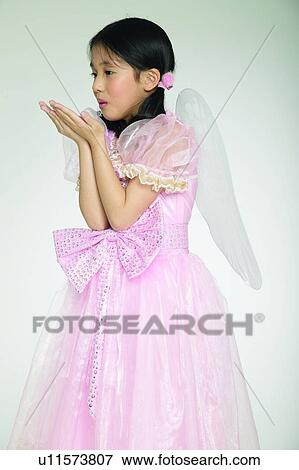 Stock Photo - Creative People, Child, Artificial Wing, Standing. Fotosearch