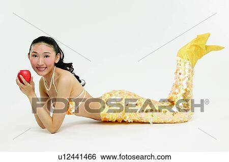 Creative, Portrait, Apple, Imagination, Food And Drink, Lying Down View Large Photo Image Stock Photograph - Creative, Portrait, Apple, Imagination, Food And Drink, Lying Down. Fotosearch
