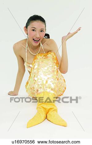 Stock Photograph - Hand Sign, One Young Woman Only, Excitement, Costume. Fotosearch