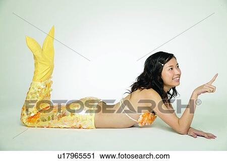 Stock Image - Happiness, Creative People, Indoor, 18-19 Years, Looking Up. Fotosearch