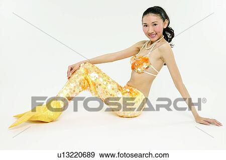 Stock Photo - Happiness, Indoor, Looking At Camera, Costume, Bizarre, Creative. Fotosearch