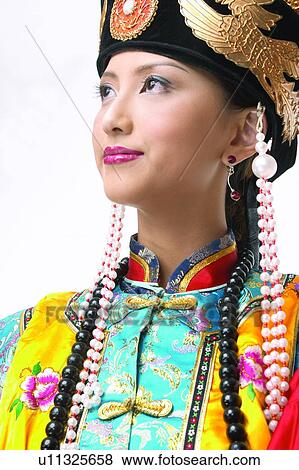 Stock Photo - Indoor, Creative People, Asian Ethnicity, Waist-Up, Bead. Fotosearch