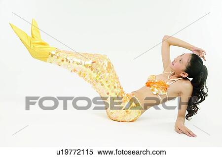 Stock Photography - Mermaid, Bizarre, Sitting On Floor, Creative, 18-19 Years. Fotosearch
