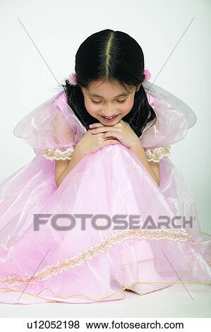 Stock Photo - One Child Only, Child, Black Hair, Contemplation, Angel. Fotosearch