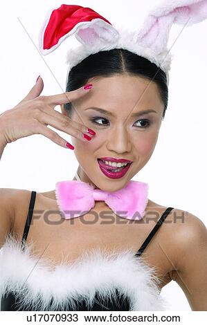 Stock Image - One Young Woman Only, Confidence, Close-Up, One Person, Indoor. Fotosearch
